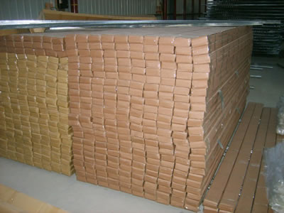 There are so many water proof cartons orderly piled up, inside them are the expanded corner beads.