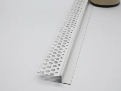 One plaster corner bead of novel shape appeared with one wing of circular holes and straight bead for corner shape.