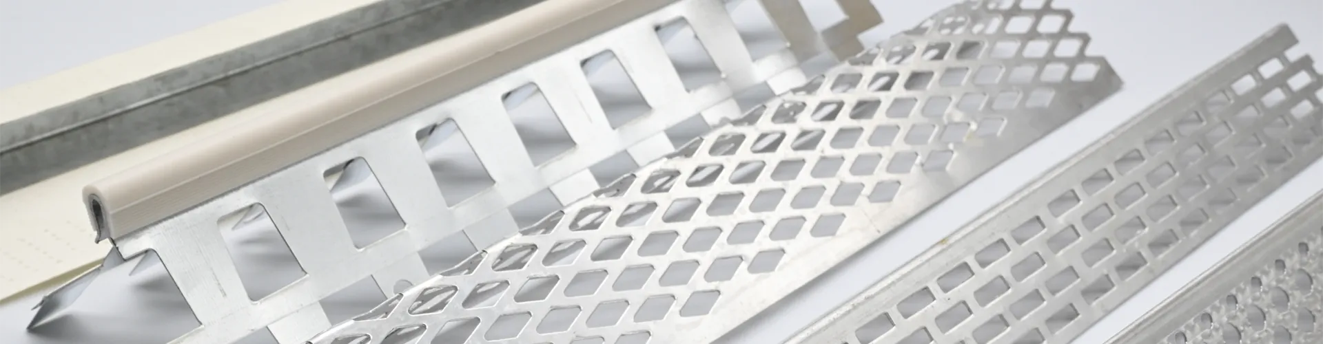 PVC and metal corner beads for wall edge protection and reinforcement.